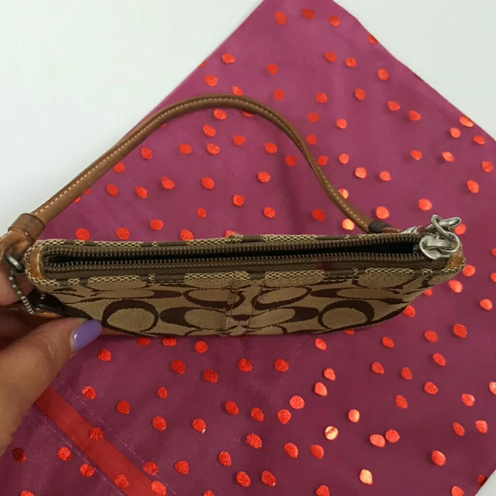 Coach brown canvas wristlet